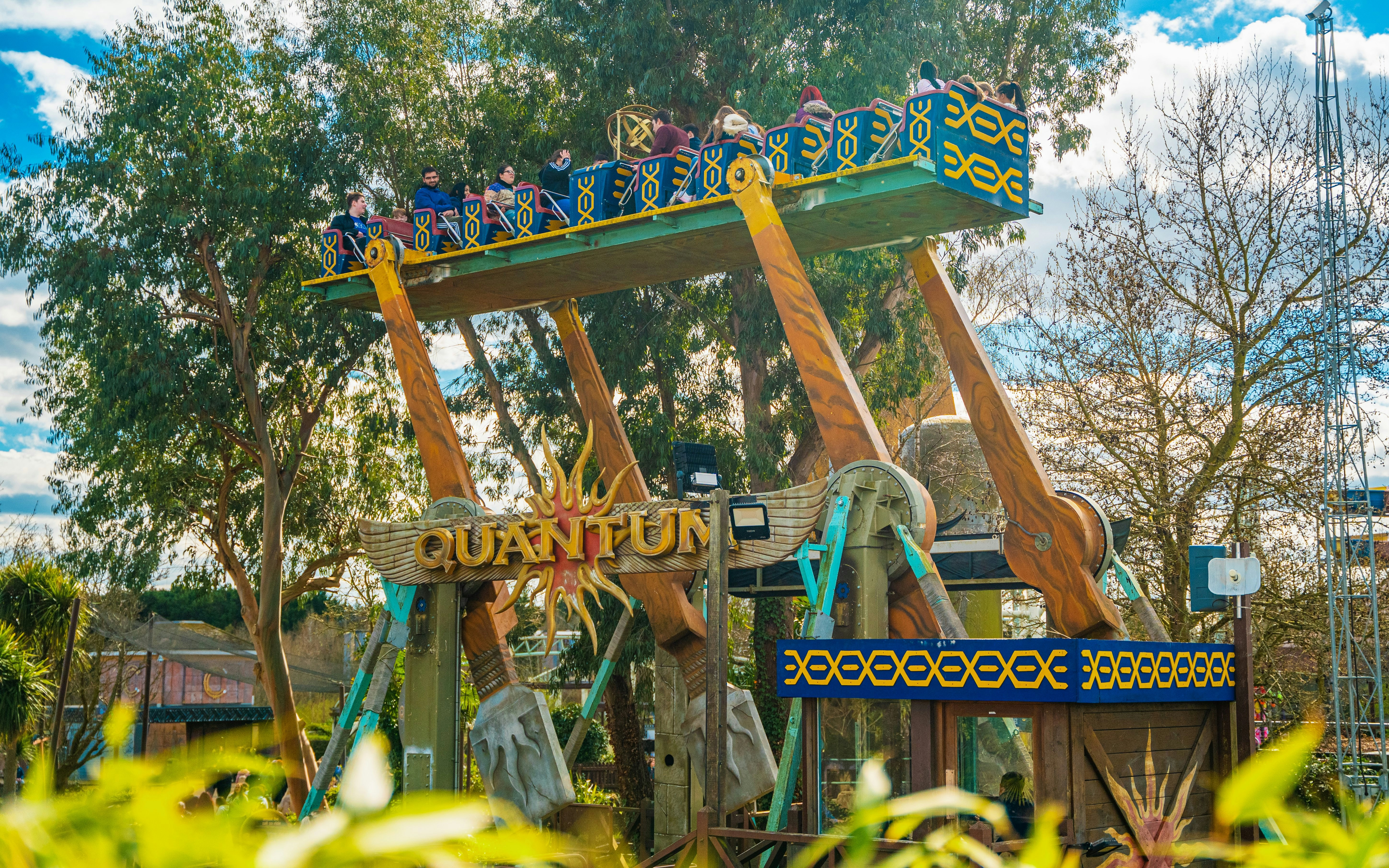 Quantum ride at Thorpe Park with passengers on a swinging platform.
