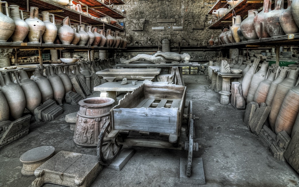 Ancient artifacts and pottery in a storage room at Pompeii, Italy.