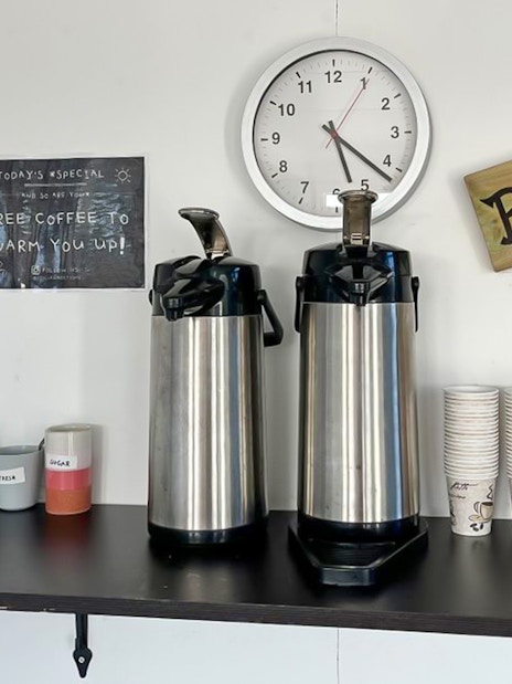 Free coffee station with thermoses and cups for Glacier expedition at Vatnajökull.