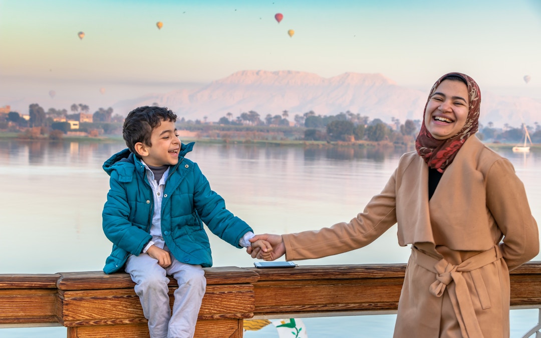 Tourist by the Nile river