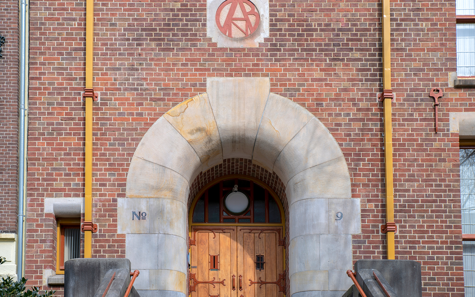 Entrance archway of De Burcht Van Berlage building in Amsterdam.