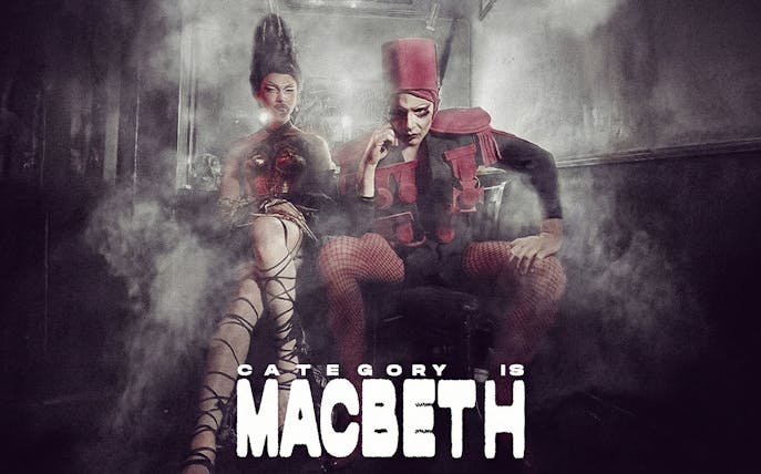 Performers in theatrical costumes with dramatic makeup and smoke, promoting Macbeth Westend.
