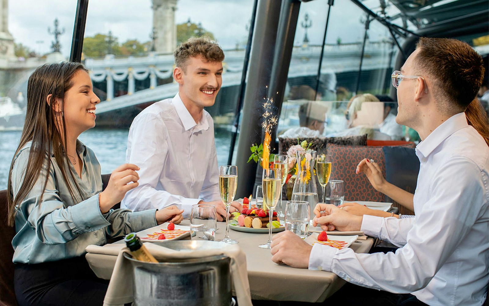 Seine River lunch cruise on Bateaux Parisiens with Eiffel Tower view in Paris.