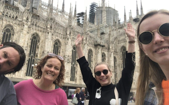 Group enjoying Milan's Duomo during self-guided city exploration game.