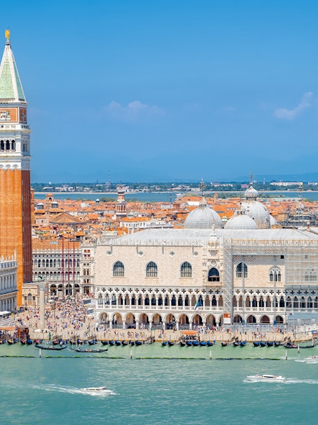 Aerial view of Doge's Palace and St. Mark's Campanile in Venice, Italy.