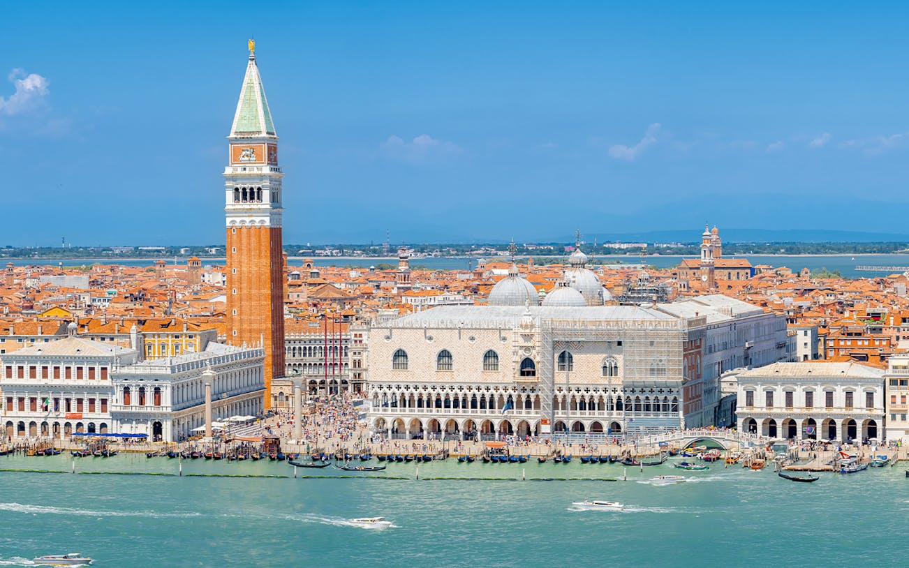 Aerial view of Doge's Palace and St. Mark's Campanile in Venice, Italy.