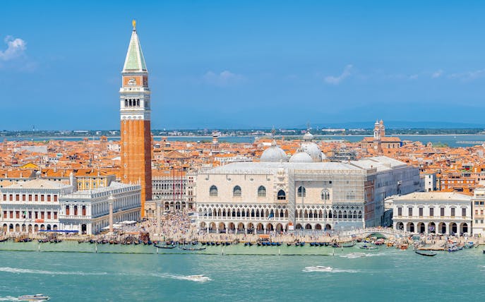 Aerial view of Doge's Palace and St. Mark's Campanile in Venice, Italy.