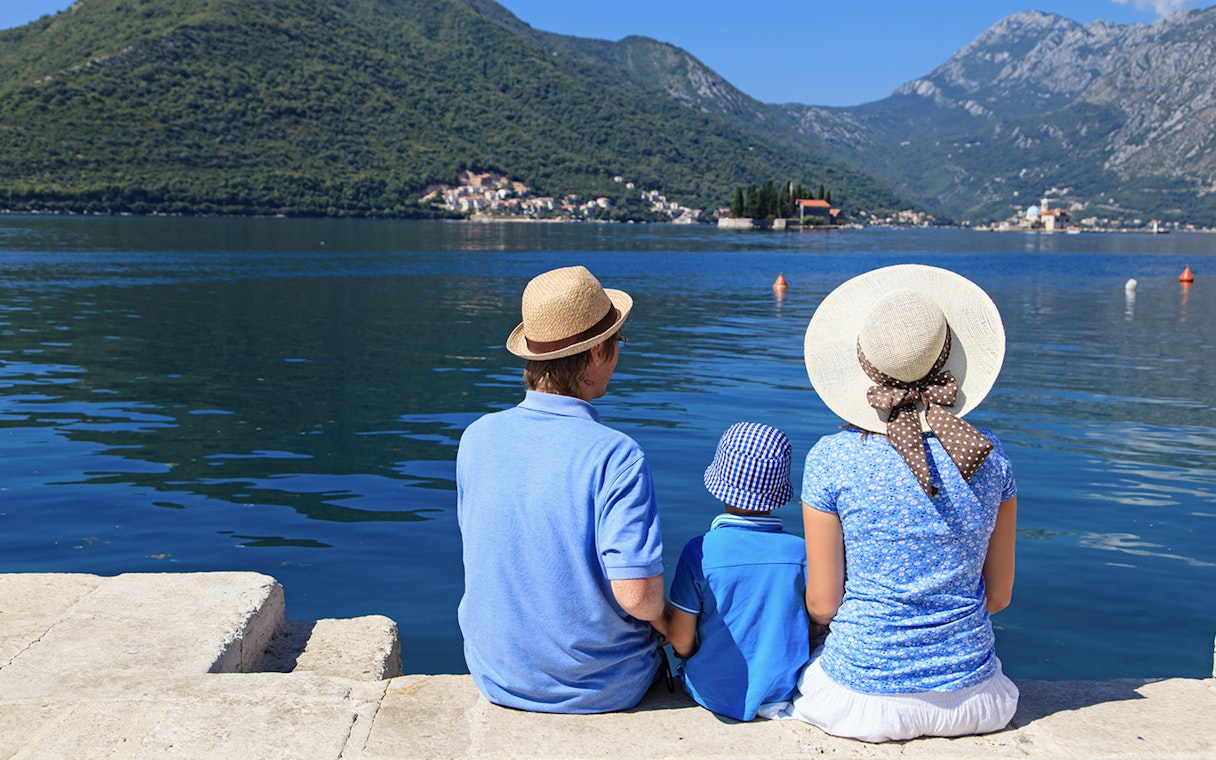 Family enjoying scenic view of Kotor Bay during Montenegro tour.
