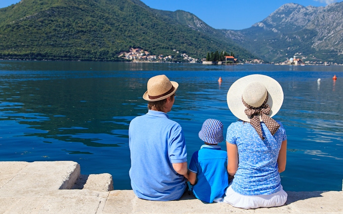 Family enjoying scenic view of Kotor Bay during Montenegro tour.