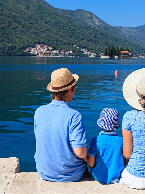 Family enjoying scenic view of Kotor Bay during Montenegro tour.