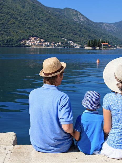 Family enjoying scenic view of Kotor Bay during Montenegro tour.