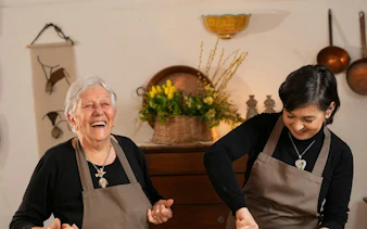 Women making traditional Sardinian sweets in a workshop, Orosei, Nuoro.