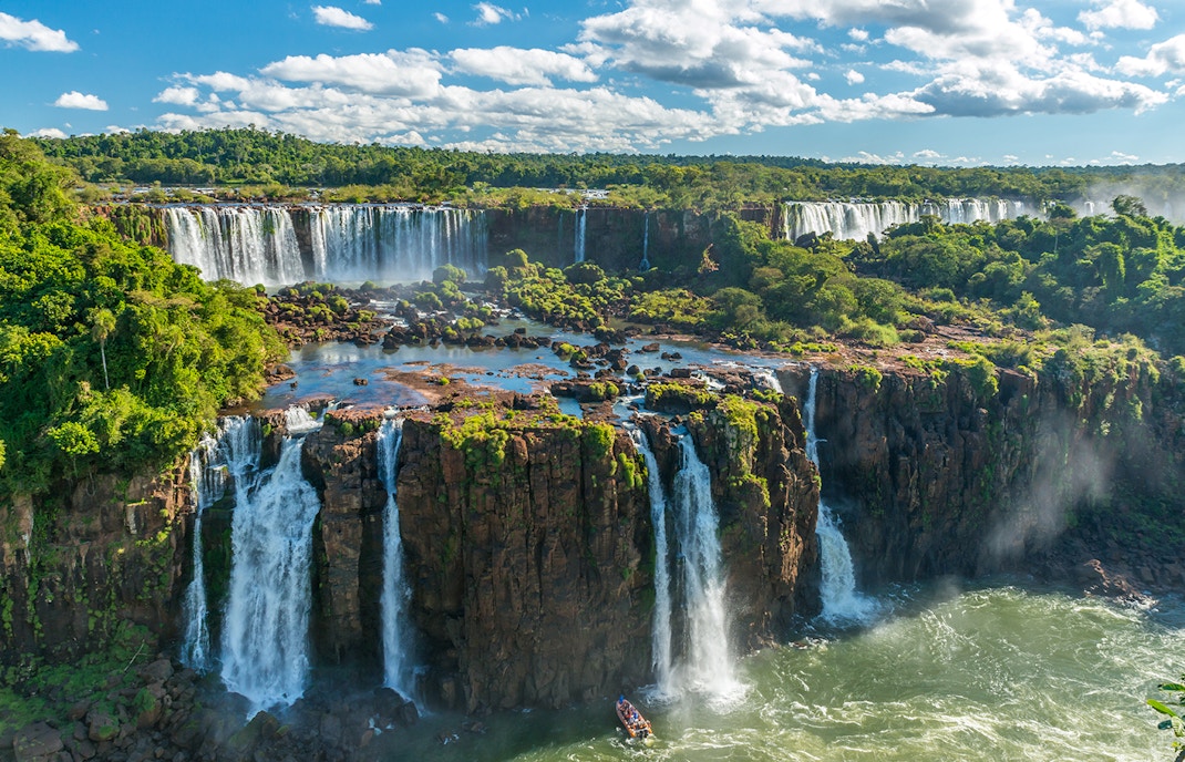 Washing gushing down Iguazu Falls, Brazil