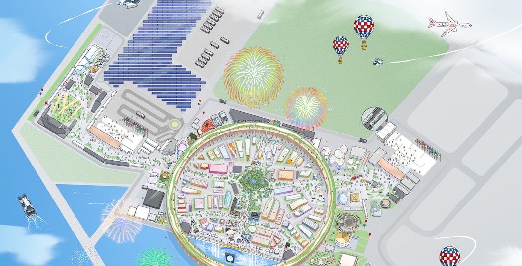 Aerial view of Expo 2025 Osaka site with fireworks and hot air balloons.
