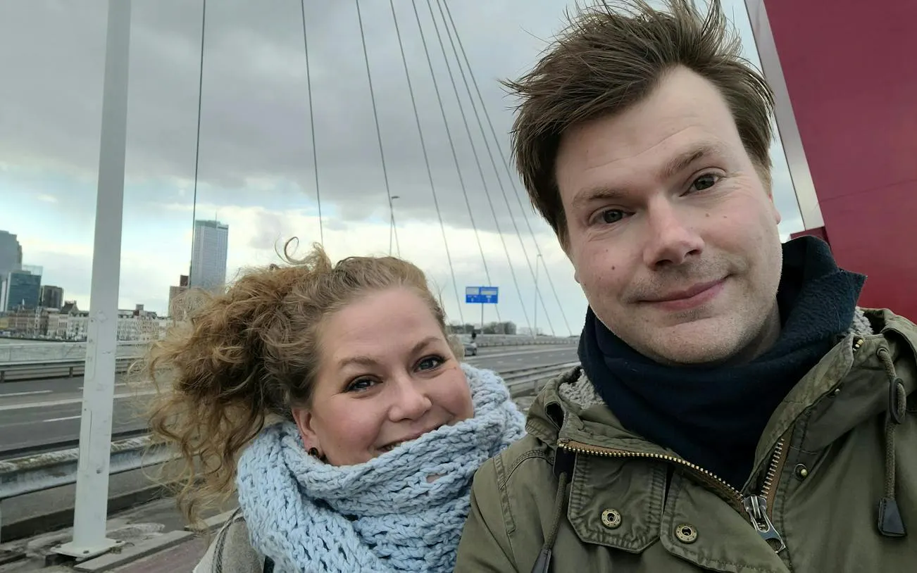 Rotterdam cityscape with Erasmus Bridge in background during self-guided exploration game.