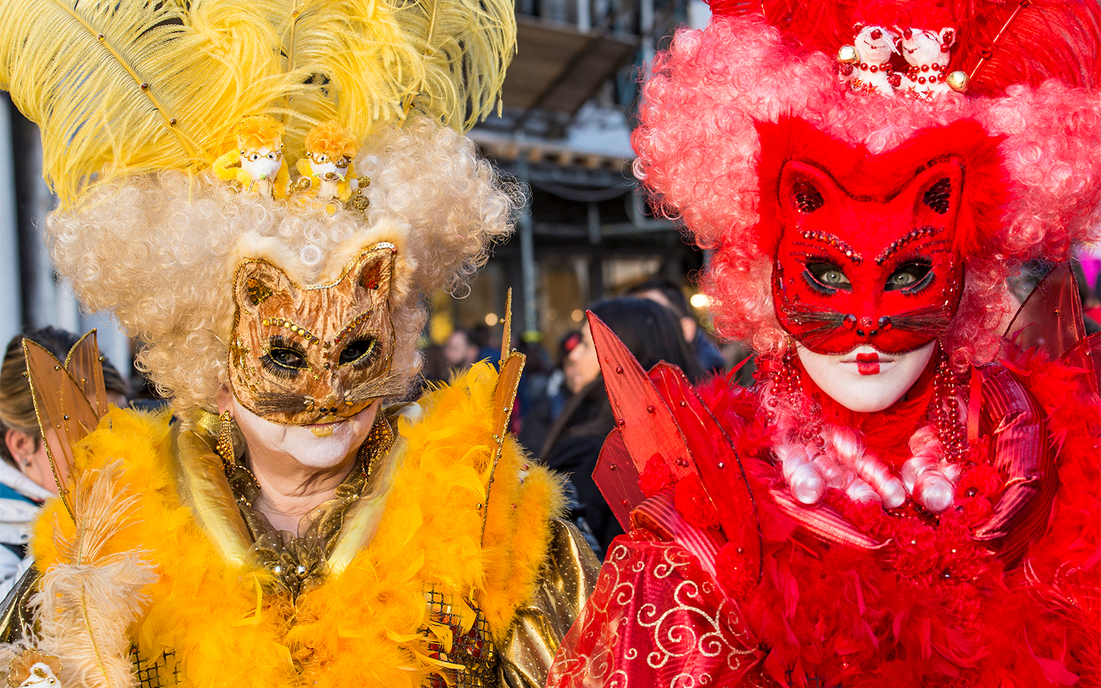 Venetian masks displayed at Venice Carnival event.