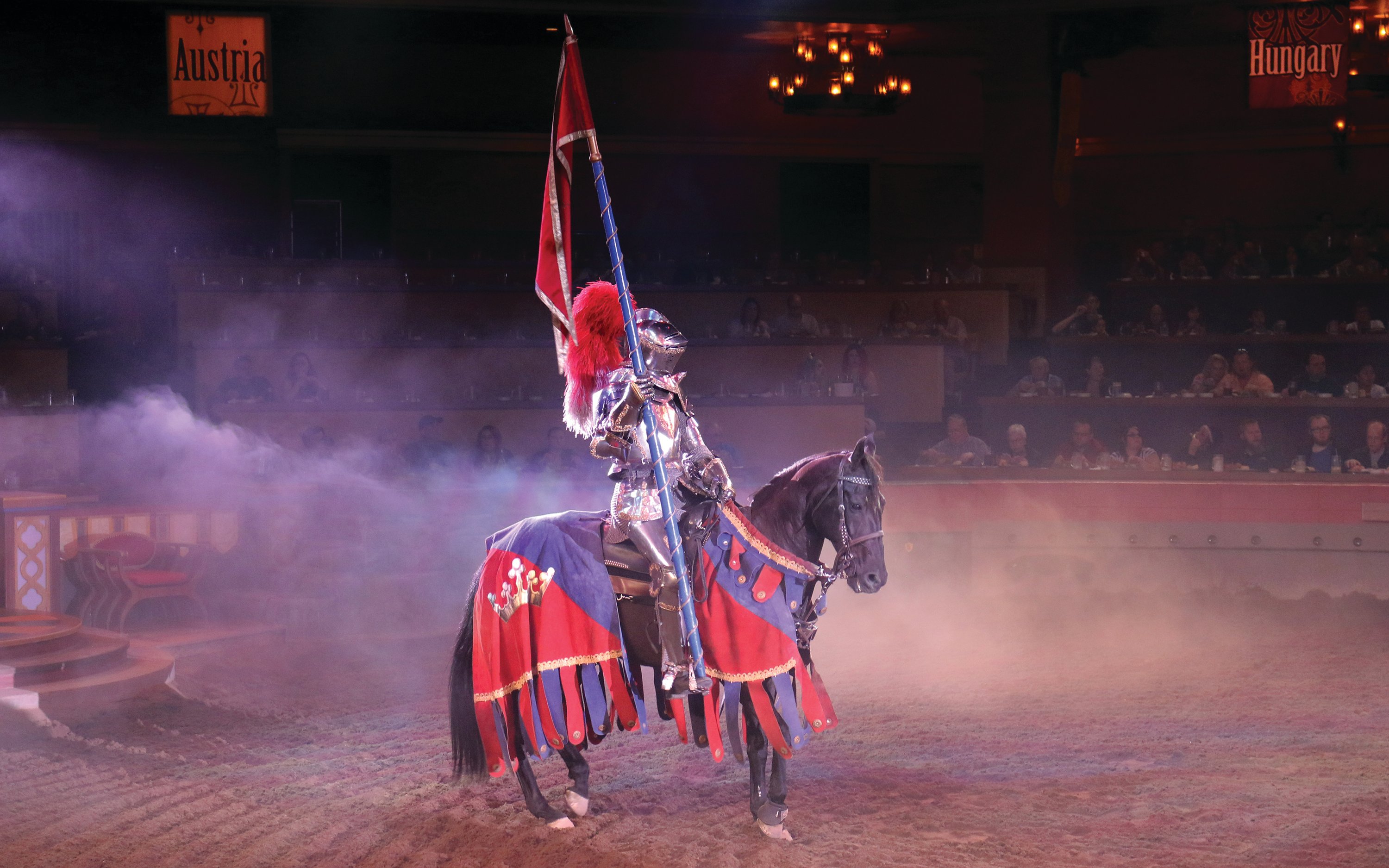 Knight on horseback with flag at Tournament of Kings, Vegas show.