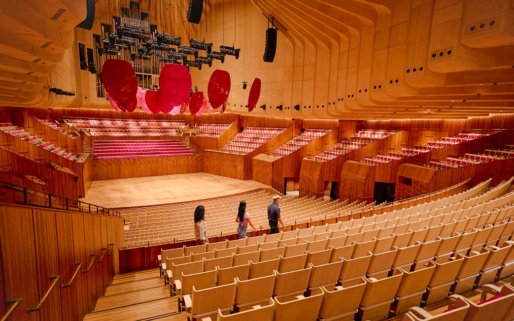 Visitors touring the interior of the Sydney Opera House.