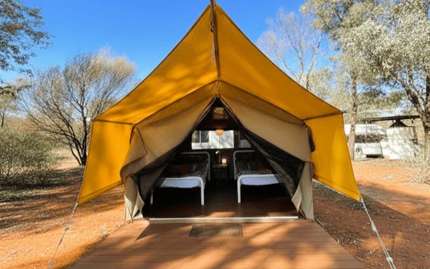 Tent setup with twin beds in Uluru & Kata Tjuta Outback camping adventure.