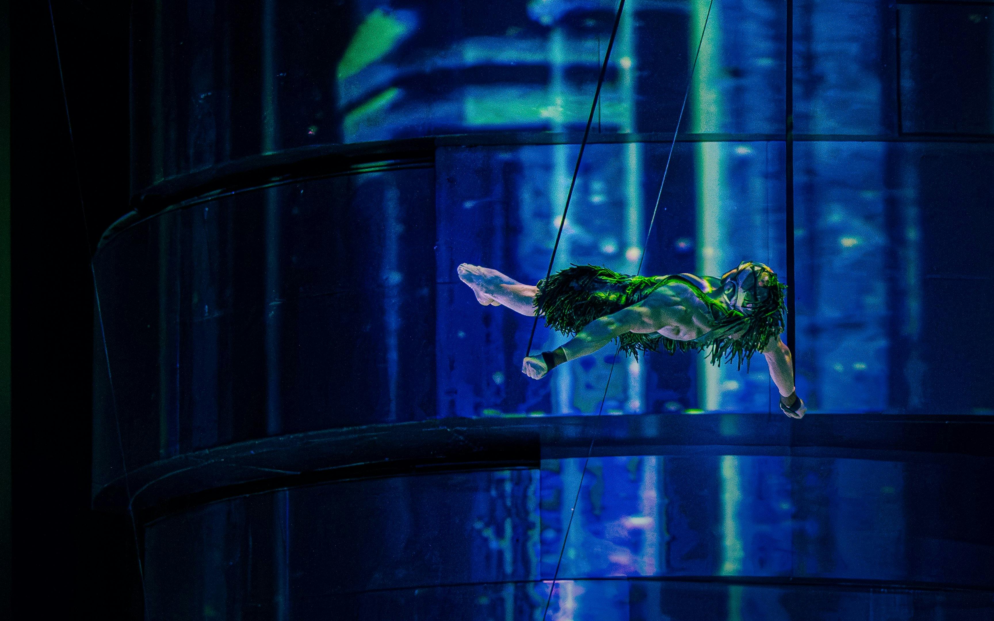 Performer in bungee swing during La Perle show in Dubai.