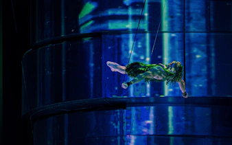 Performer in bungee swing during La Perle show in Dubai.