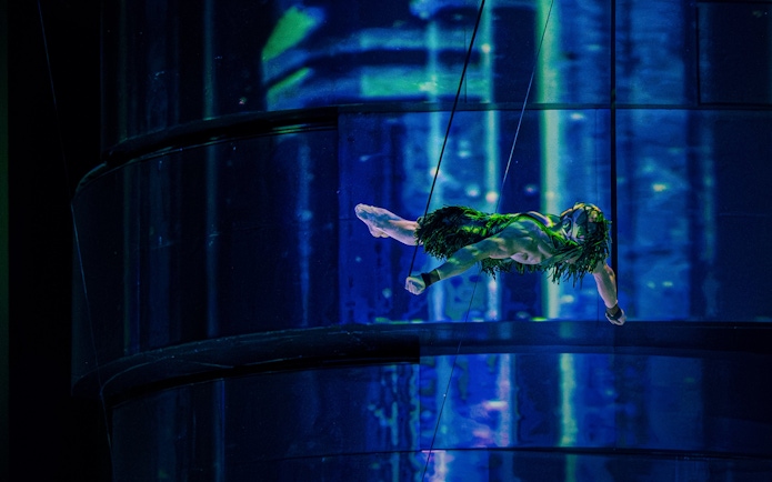 Performer in bungee swing during La Perle show in Dubai.