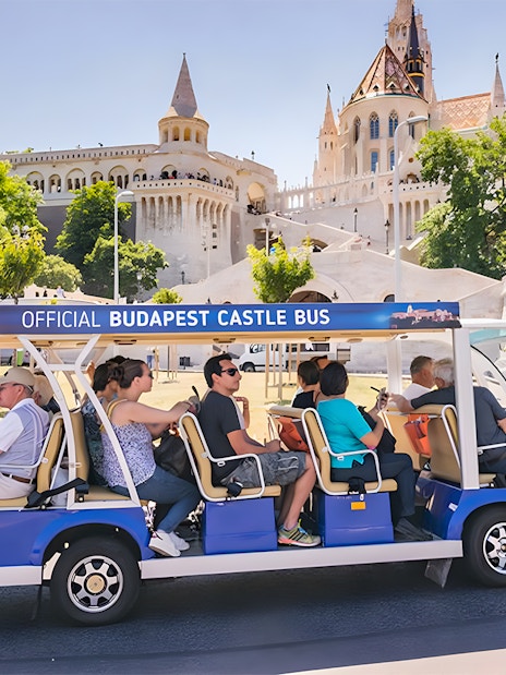 Budapest Castle Bus near Fisherman's Bastion with tourists in Budapest.