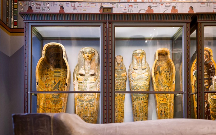 Sarcophagi in the Egyptian Oriental Collection room at Kunsthistorisches Museum Vienna.