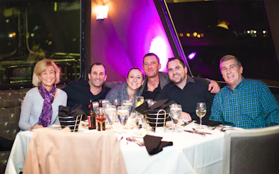 Group dining on Premier Dinner Cruise, City Cruises, Boston.
