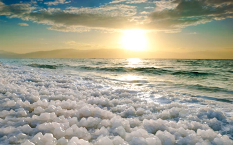 Dead Sea salt formations at sunrise, Amman half-day trip experience.