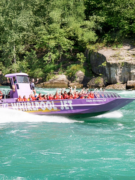 Guests enjoying Whirlpool Jet Boat Tour in Niagara Gorge, Canada.