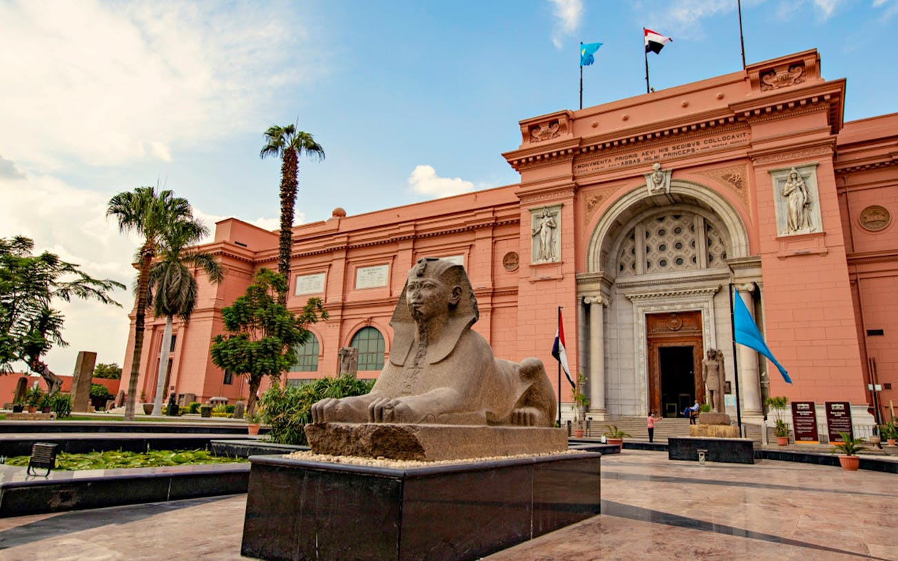 Egyptian Museum entrance with sphinx statue, Cairo.