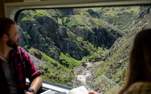 View of Deep Stream Bridge from Taieri Gorge train window, New Zealand.