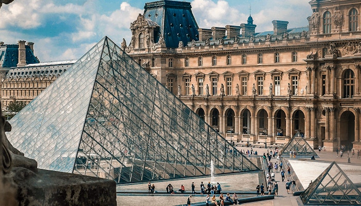 Louvre Museum glass pyramid entrance, Paris, with direct entry tickets.