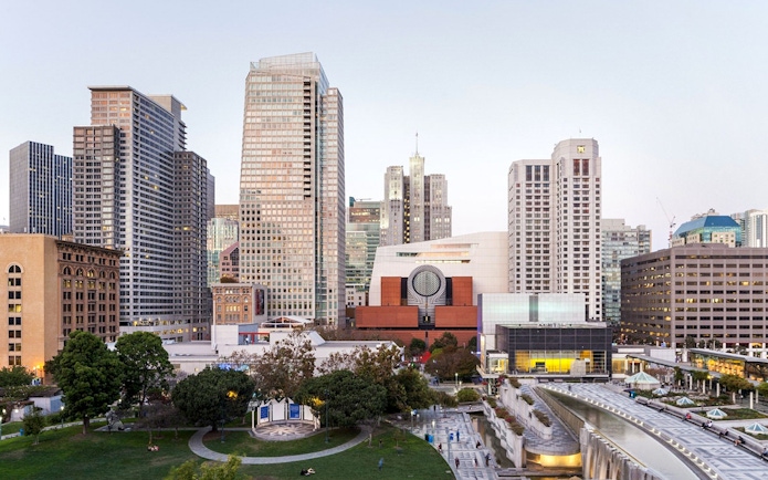 San Francisco Museum of Modern Art with city skyline in the background.