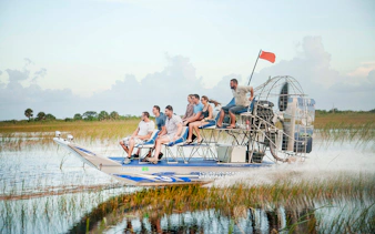 Group enjoying an airboat tour in the Everglades, Florida.