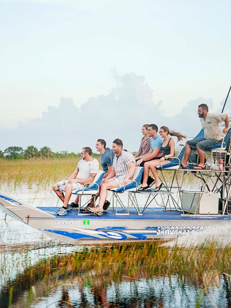 Group enjoying an airboat tour in the Everglades, Florida.