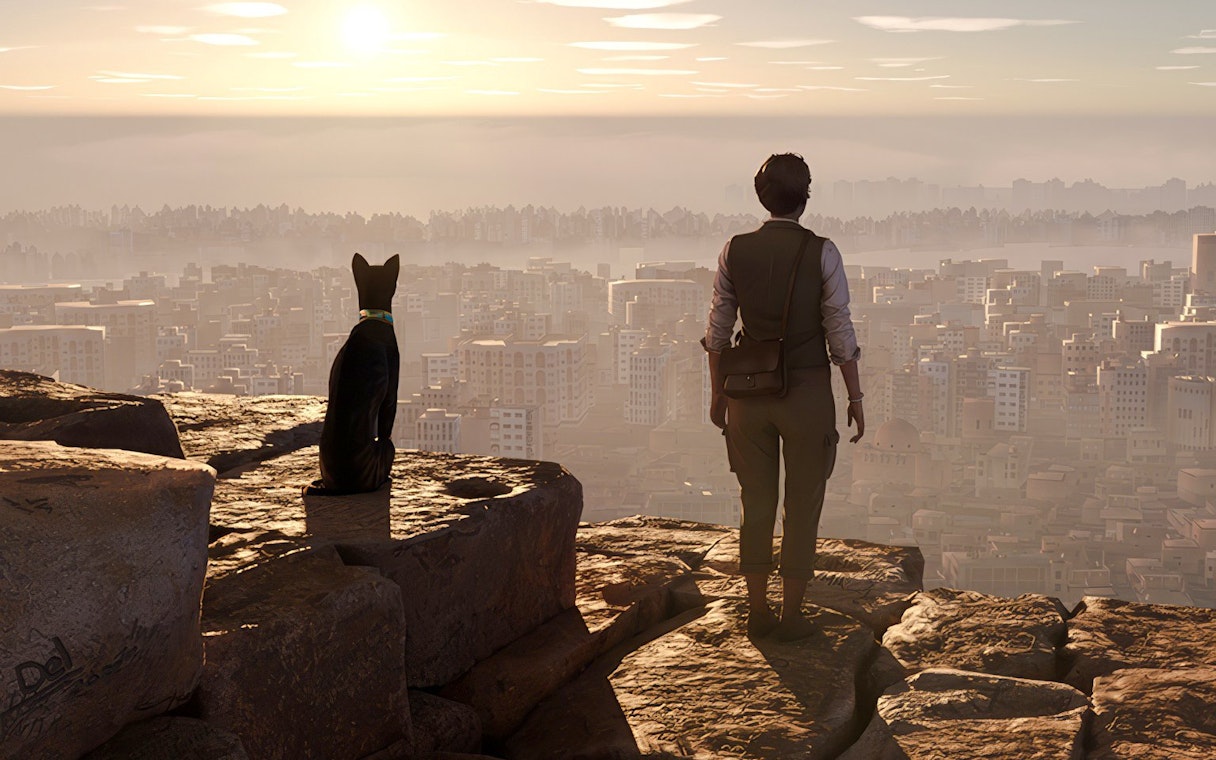 Person and cat overlooking cityscape in Horizon of Khufu virtual reality experience.