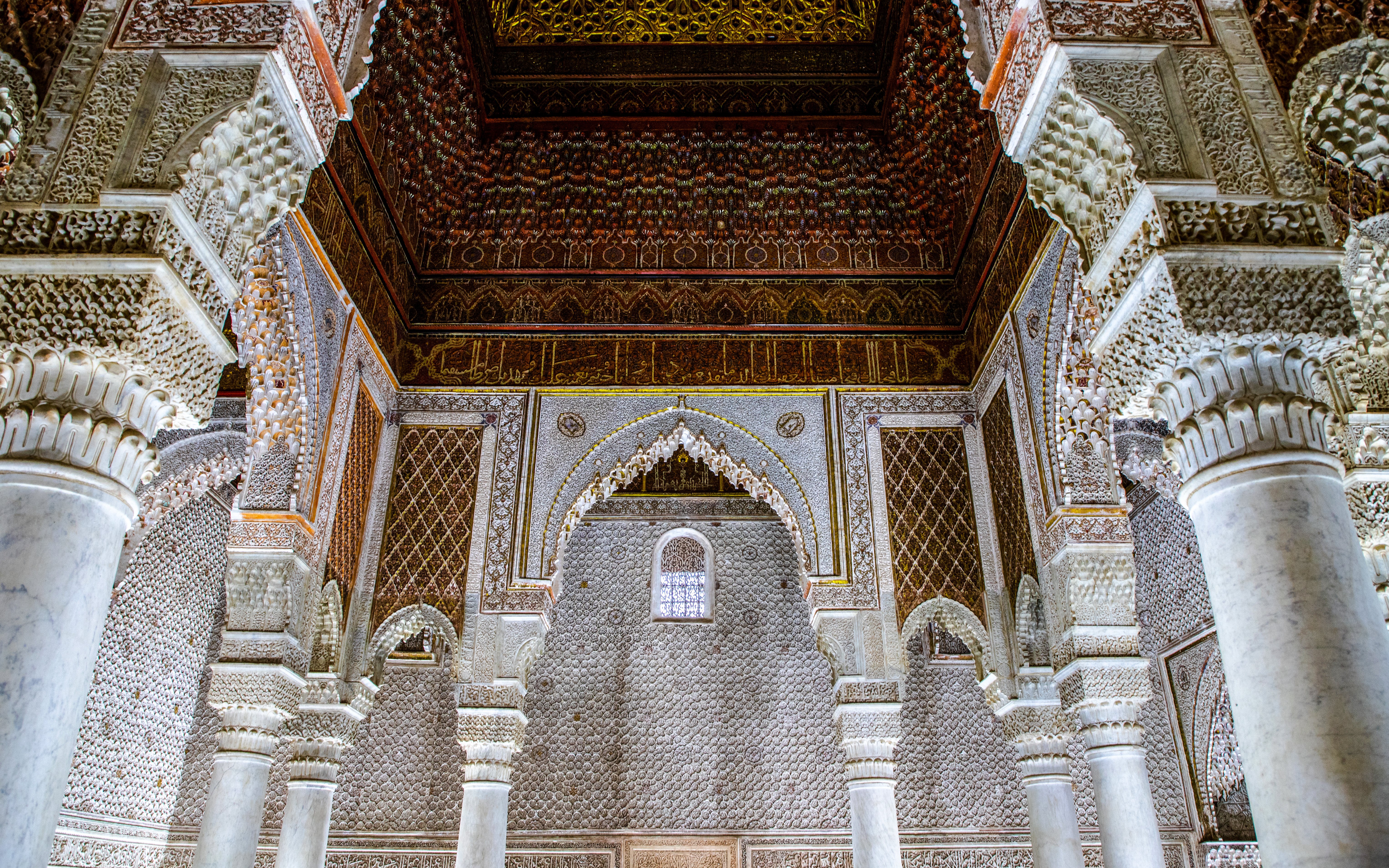 Saadian Tombs mausoleum interior with ornate arches and columns in Marrakech, Morocco.