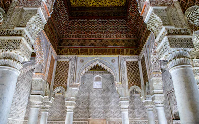 Saadian Tombs mausoleum interior with ornate arches and columns in Marrakech, Morocco.