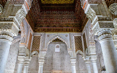 Saadian Tombs mausoleum interior with ornate arches and columns in Marrakech, Morocco.