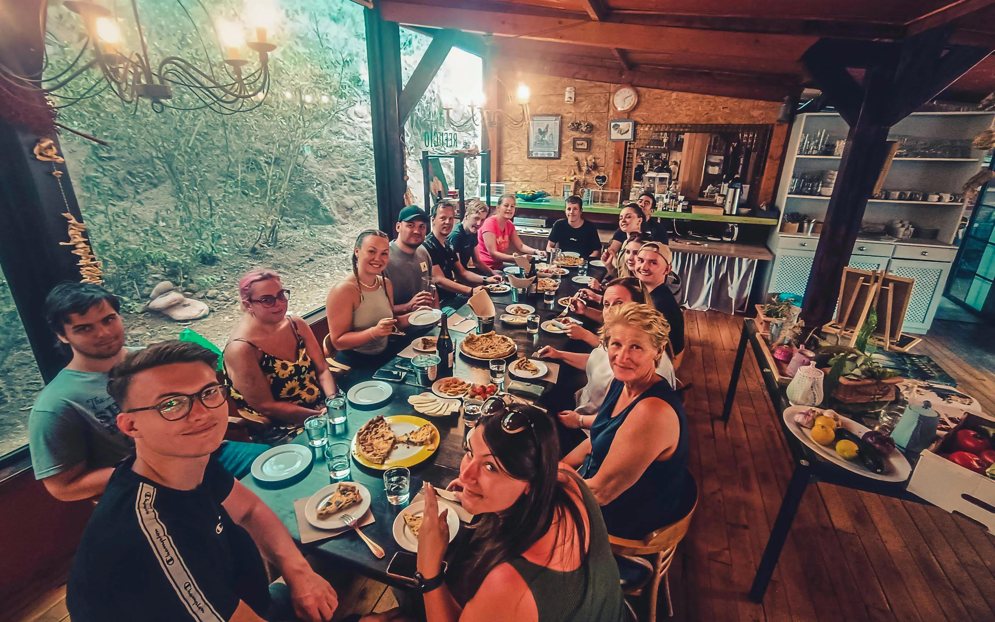 Group enjoying local food tasting on Gran Canaria volcano sunset tour.