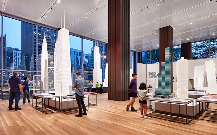 Guests exploring architectural models at the Chicago Architectural Center.