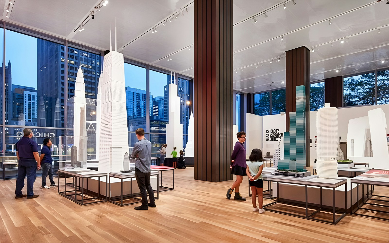 Guests exploring architectural models at the Chicago Architectural Center.