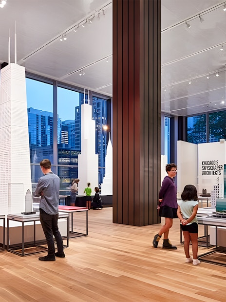 Guests exploring architectural models at the Chicago Architectural Center.