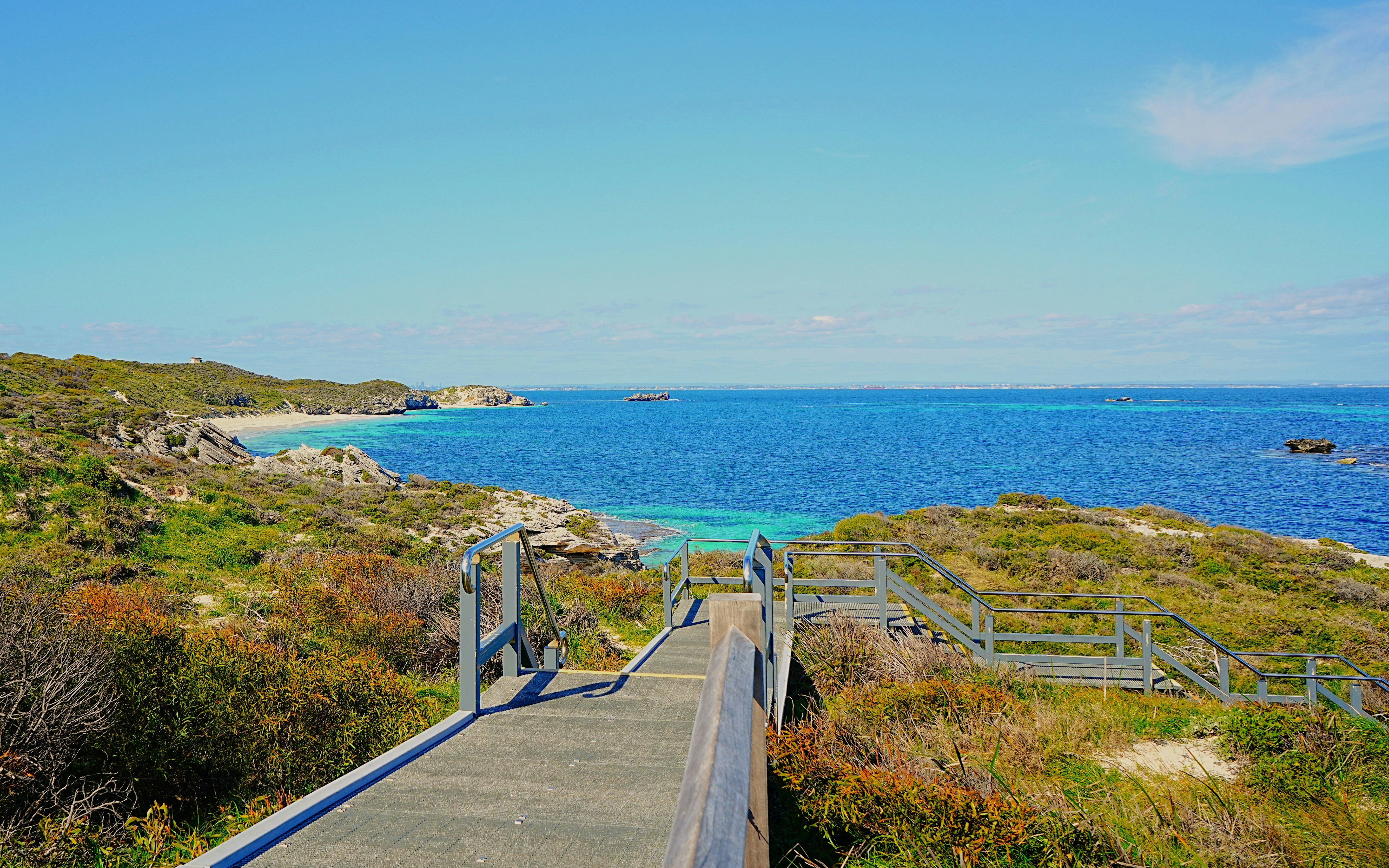 Boardwalk leading to ocean view on Rottnest Island, Australia.
