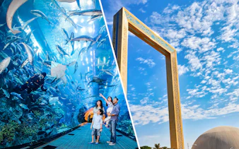 Dubai Aquarium tunnel with family and diver, Dubai Frame against blue sky.