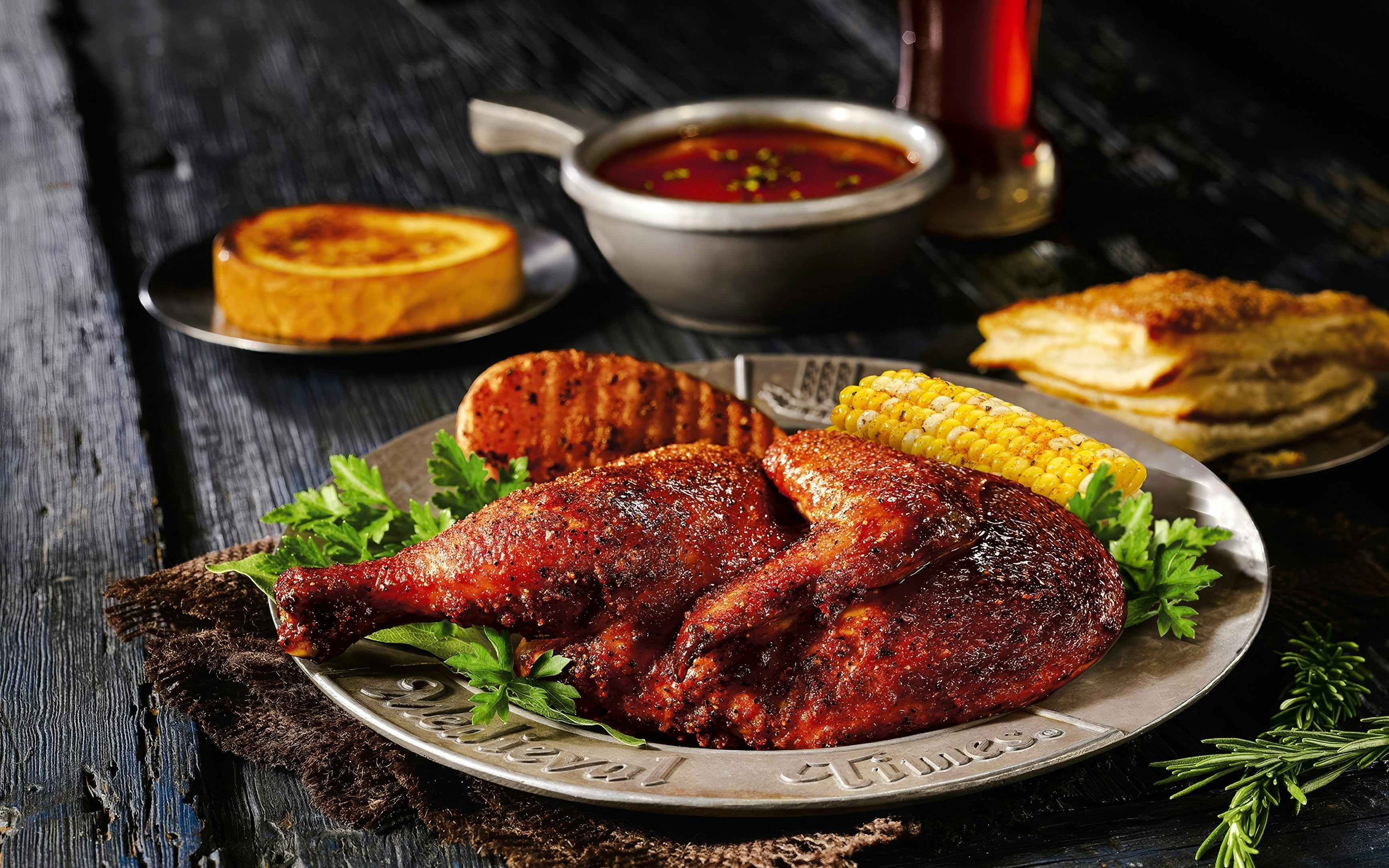 Roasted chicken with corn and bread at Medieval Times Dinner and Show.