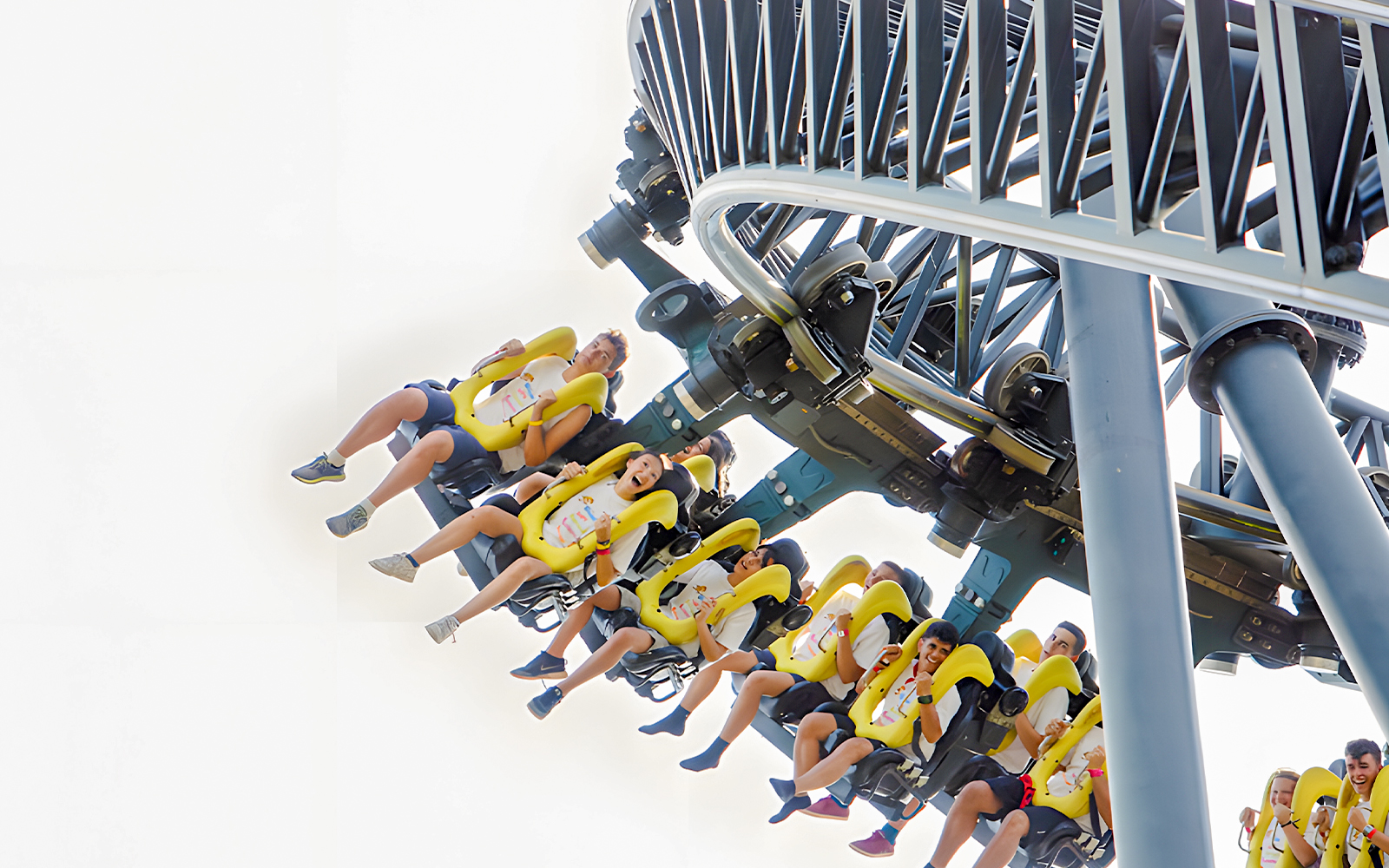 Riders on the Tornado roller coaster at Parque de Atracciones de Madrid.