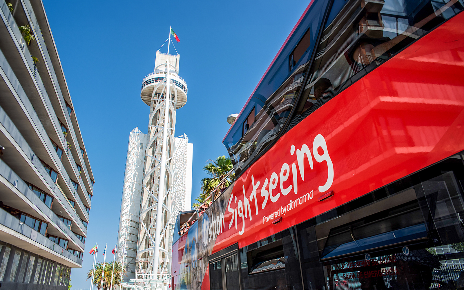 Vasco da Gama Tower with sightseeing bus in Lisbon.
